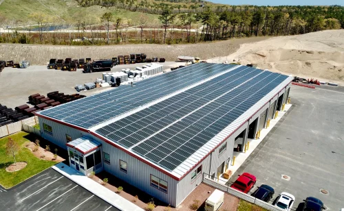 Commercial building rooftop with solar panel array